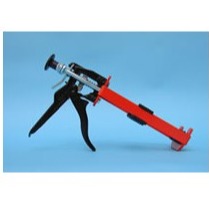 Pouring pad dispense gun